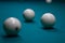 Billiard green table in hall with white balls