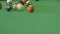 Billiard or pool table with balls being breaking