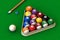Billiard set on green