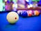 Billiard snooker white ball number close up on pool blue table