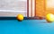 Billiard table close up. Playing billiard. Billiards balls and cue on green billiards table. Billiard sport concept. Pool billiard