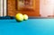 Billiard table close up. Playing billiard. Billiards balls and cue on green billiards table. Billiard sport concept. Pool billiard