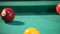 Billiard, white ball hits a red and slowly enters the hole