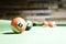 Billiards. Green billiards table with balls.