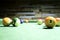 Billiards. Green billiards table with balls.