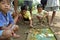 Billiards playing Filipino children