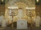 Bima, an elevation usually in the center of the synagogue, where there is a special table for public reading of the