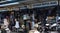 binjai, indonesia - october 6, 2023 : row of shops selling religious equipment and herbs at the grand mosque of binjai