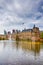 Binnenhof Palace of Parliament inThe Hague in The Netherlands At Daytime. Against Modern Skyscrapers on Background