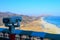 Binocular in the Goseong Unification Observatory with a background of beach and mountains.