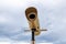 Binocular telescope on the observation deck for tourists sightseeing. Binoculars close-up on the background of the sky