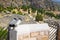 Binoculars and ancient city Delphi, Greece