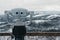 Binoculars in Bukovel ski resort, snow, mountains and trees on the background.