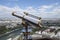 Binoculars overlooking panorama of Paris