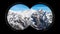 Binoculars Point of View with Snow Capped Peaks of Italian Alps