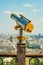 Binoculars on the second floor of the eiffel tower watching over park champs de mars.