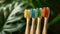 biodegradable bamboo toothbrushes for children, vibrant bristles, set against a green leafy background, emphasizing eco