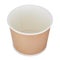 Biodegradable beige outside and white inside paper Cup for soup and salads, isolated on a white background. Top view.