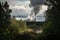 bioenergy power plant, with smoke billowing from the stacks