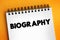 Biography is a detailed description of a person\\\'s life, text concept on notepad