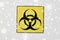 Biohazard caution sign on white background