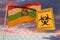 Biohazard coronavirus sign against flying flag of La Rioja, an autonomous community in Spain. Quarantine related 3D