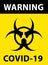 Biohazard symbol on yellow background with the words \\\