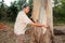 Biologist examine the bark of a Eucalyptus tree