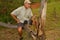 Biologist out in the savannas of Brazil, inspecting a tree