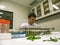 Biologist researches orange leaves in a citrus research lab