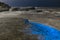 Bioluminescent tide glows on some rocks in La Jolla, California