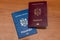 Biometric passports of citizens of the Republic of Moldova of red and blue colors. Covers of documents of different colors.