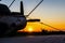 Biplane standing at sunset