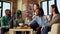 BIPOC mates enjoying social life in brick wall living room