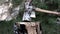 Birch log is chopped with an ax. The guy is chopping wood. Closeup of the hands of a young man. natural background of