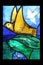 Bird, detail of Saint Francis of Assisi stained glass window in Benediktbeuern Abbey, Germany