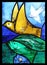 Bird, detail of Saint Francis of Assisi stained glass window in Benediktbeuern Abbey, Germany