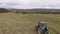 Bird eye of Hay rake tractor turning the hay