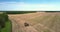 Bird eye view agricultural equipment stands on field