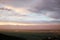 Bird eye on view on Alazani valley, clouds in the sky sunset