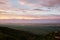 Bird eye on view on Alazani valley, clouds in the sky sunset