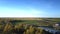 Bird eye view livestock complex among fields and forests