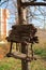 Bird feeder made of wooden sticks, autumn