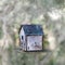Bird house with soft focus background hanging
