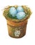 Bird nest with blue eggs in a flowerpot with a decorative heart, homes decor for Easter.