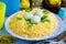 Bird nest Easter salad decorated with boiled egg yolks and cheese