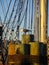 Bird on Pier with Ship in Background