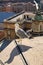 Bird on rooftop of the dome of St. Peter`s Basilica in Vatican. Seagull stands at the end of the roof. Seagull is watching Rome in