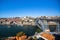 Bird`s-eye view Douro river and Dom Luis I bridge, shot from Vila Nova de Gaia, Porto.