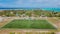 Bird`s eye view of the football pitch at the Maamigili tropical island at the Alif Dhaal Atoll at the indian ocean